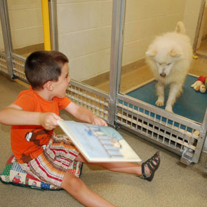 Dogs Help Children Read - Children reading to dogs at the Missouri Humane Society's Shelter Buddies Reading Program.